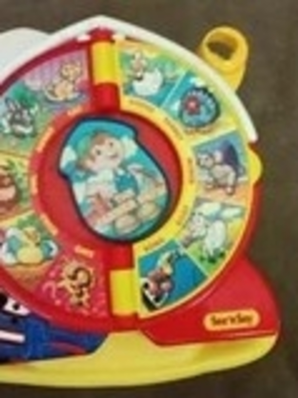 Fisher-Price Colorful Musical Animal Spinner - Red, Yellow & Blue
